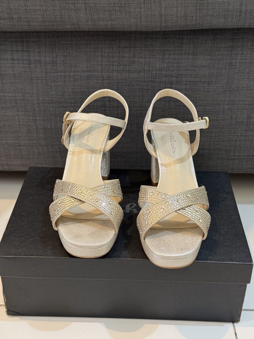 Matthews Sparkly Embellished Block Heels (Category: Heels) located in Taguig. Submitted by rgspreloved (Listing ID 1462048475, Image 2). Description: - Sparkly silver block heels by Matthews - Rhinestone-embellished - Ankle strap with buckle closure - Comfortable chunky heel - Perfect for parties and special occasions - Comes with original box.