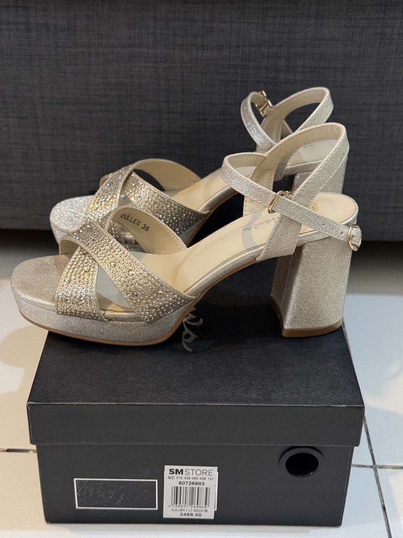 Matthews Sparkly Embellished Block Heels (Category: Heels) located in Taguig. Submitted by rgspreloved (Listing ID 1462048475, Image 1). Description: - Sparkly silver block heels by Matthews - Rhinestone-embellished - Ankle strap with buckle closure - Comfortable chunky heel - Perfect for parties and special occasions - Comes with original box.