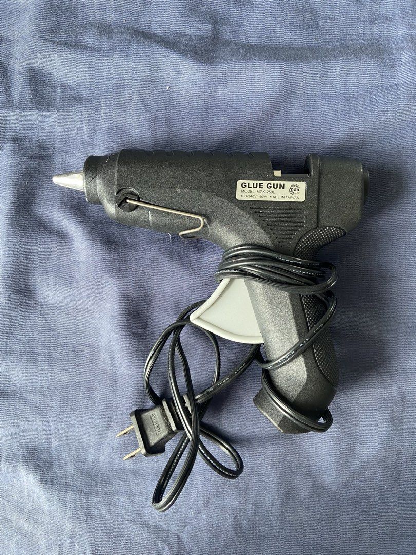 MAX Glue Gun Model MGK-250L (Category: Craft Supplies & Tools) located in Mandaluyong City. Submitted by coolmami (Listing ID 1462069511, Image 2). Description: - MAX Glue Gun, Model MGK-250L - Made in Taiwan - Standard plug - Ideal for crafts and repairs - Features cord wrap for convenient storage - Ready for your next project.