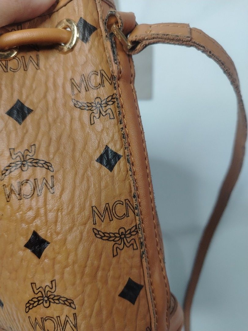 MCM cognac Visetos monogram bucket bag (Category: Shoulder Bags) located in San Carlos. Submitted by fashiondesancarlos05 (Listing ID 1462090217, Image 3). Description: Needs cleaning Needs restoration.