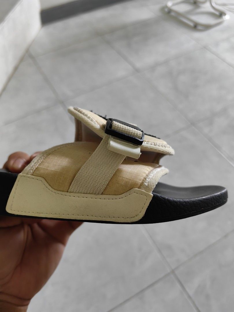 MCQ BY MCQ No.0 Slides Sandals (Category: Slippers & Slides) located in Cavite. Submitted by murdge (Listing ID 1462068707, Image 2). Description: MCQ Icon Zero Infinity Slides – Black/White Premium MCQ Icon Zero Infinity Slides featuring a modern black-and-white design with adjustable buckle detail. Clean, stylish, and easy to pair with casual or streetwear outfits. Original Retail Price: 570 AED or 9700php Condition: Like New/ once lang ginamit