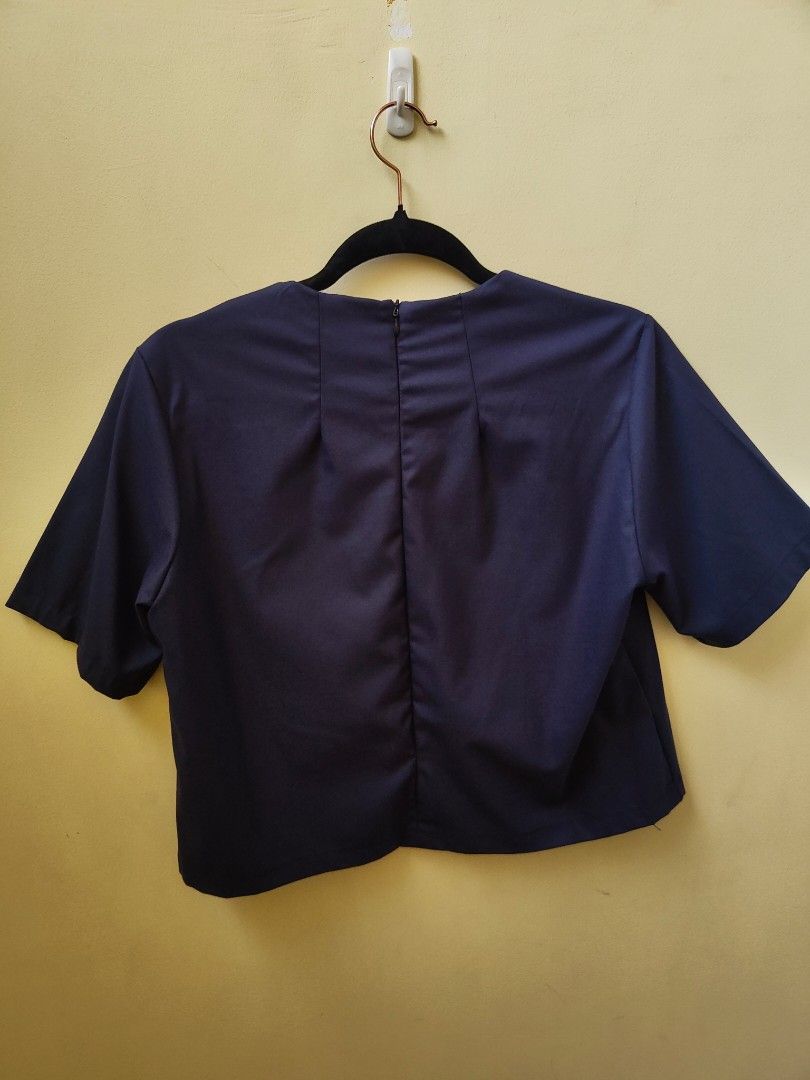 MEG Dark Blue Blouse Size S (Category: Others Tops) located in Quezon City. Submitted by teleh.reyes (Listing ID 1462065774, Image 3). Description: - Zipper closure at the back - Short sleeves - Simple and classic design - Versatile for casual or work wear - Fits size S.