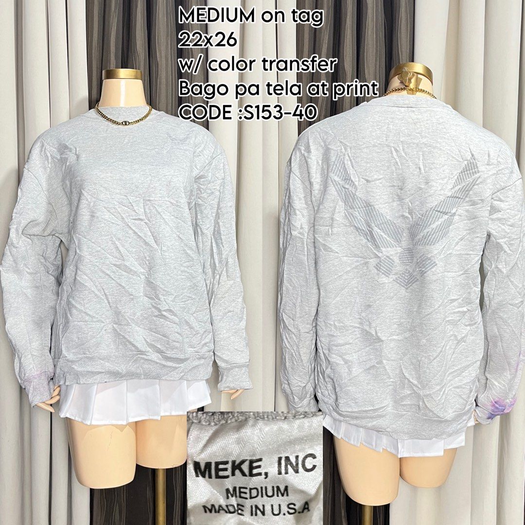 MEKE, INC. Gray Sweatshirt Medium - US Air Force Graphic (Category: Coats, Jackets and Outerwear) located in Naga. Submitted by rmapprl (Listing ID 1462178530, Image 1). Description: - Brand: MEKE, INC. - US Sweatshirt - Size: Medium - Origin: Made in USA - Design: Gray sweatshirt with color transfer graphic (US Air Force theme) - Condition: New fabric and print, but has minor purple stains on the left sleeve. Please check photos for exact condit
