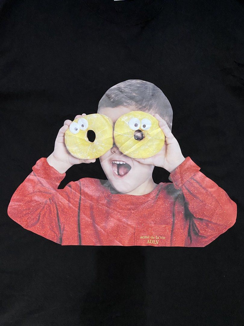 Men's Acme Dela Vie 'Donut Boy' Shirt (Category: Tshirts & Polo Shirts ) located in Carmen. Submitted by yawbuangaka (Listing ID 1460449151, Image 2). Description: Men's ADLV 'Donut Boy' Shirt •Black •Size 1 •Length - 28 •Width - 21 •Like new.