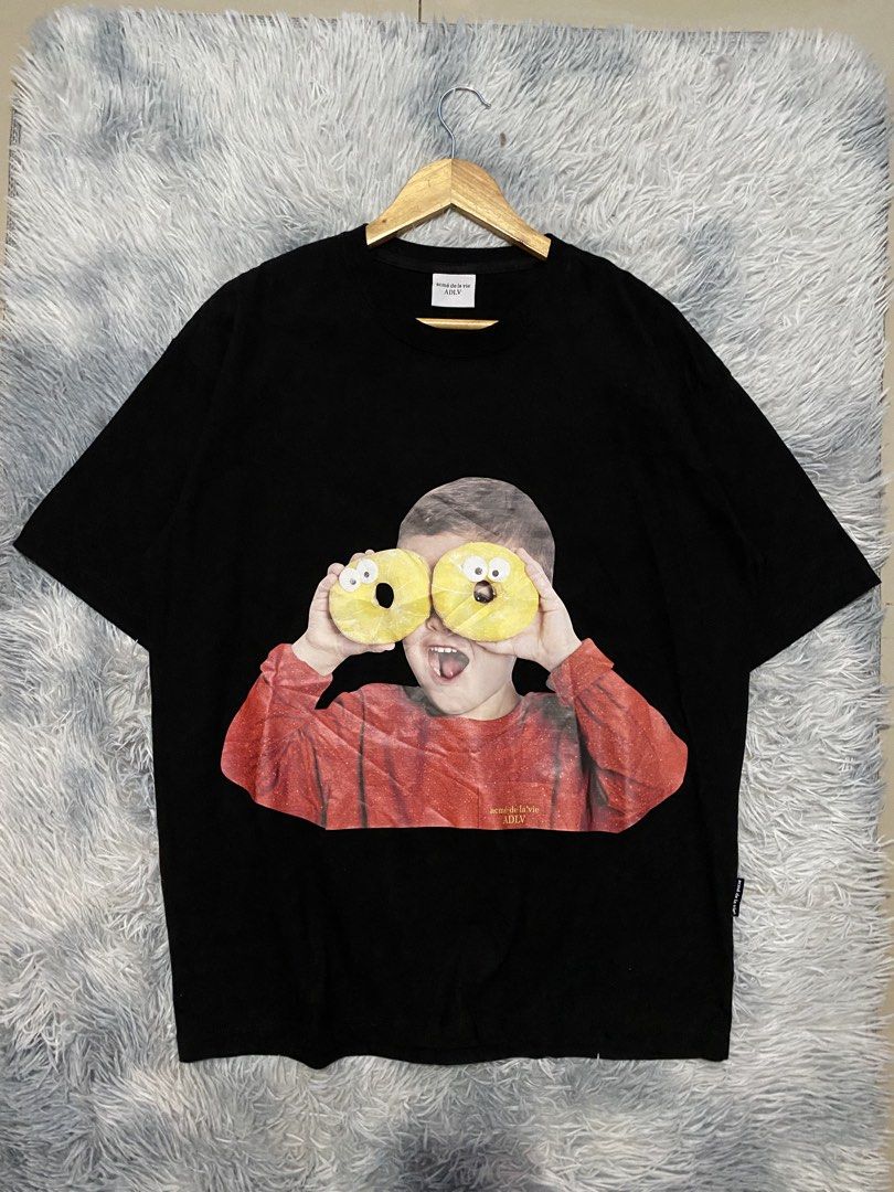 Men's Acme Dela Vie 'Donut Boy' Shirt (Category: Tshirts & Polo Shirts ) located in Carmen. Submitted by yawbuangaka (Listing ID 1460449151, Image 1). Description: Men's ADLV 'Donut Boy' Shirt •Black •Size 1 •Length - 28 •Width - 21 •Like new.