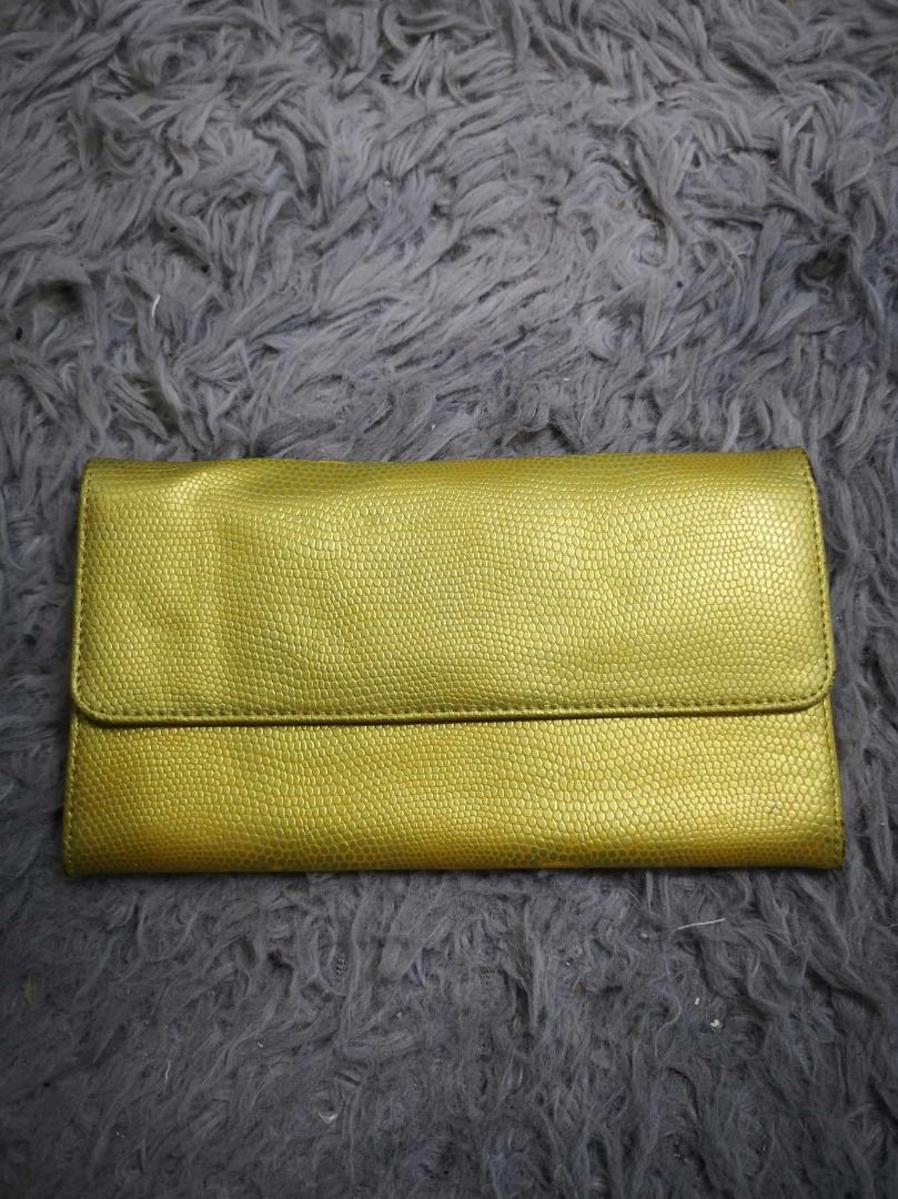 Metallic Gold Clean Flap Long Wallet (Category: Wallets & Card holders) located in Santa Cruz. Submitted by jmy_surplus.2 (Listing ID 1462175610, Image 1). Description: Size ; L - 4.6 W - 7.6 Color ; Gold Type ; Wallet Brand ; No brand Material ; Synthetic Style ; Snap Closure Flap Long Wallet LR 129 JMY 1 Batch #221.