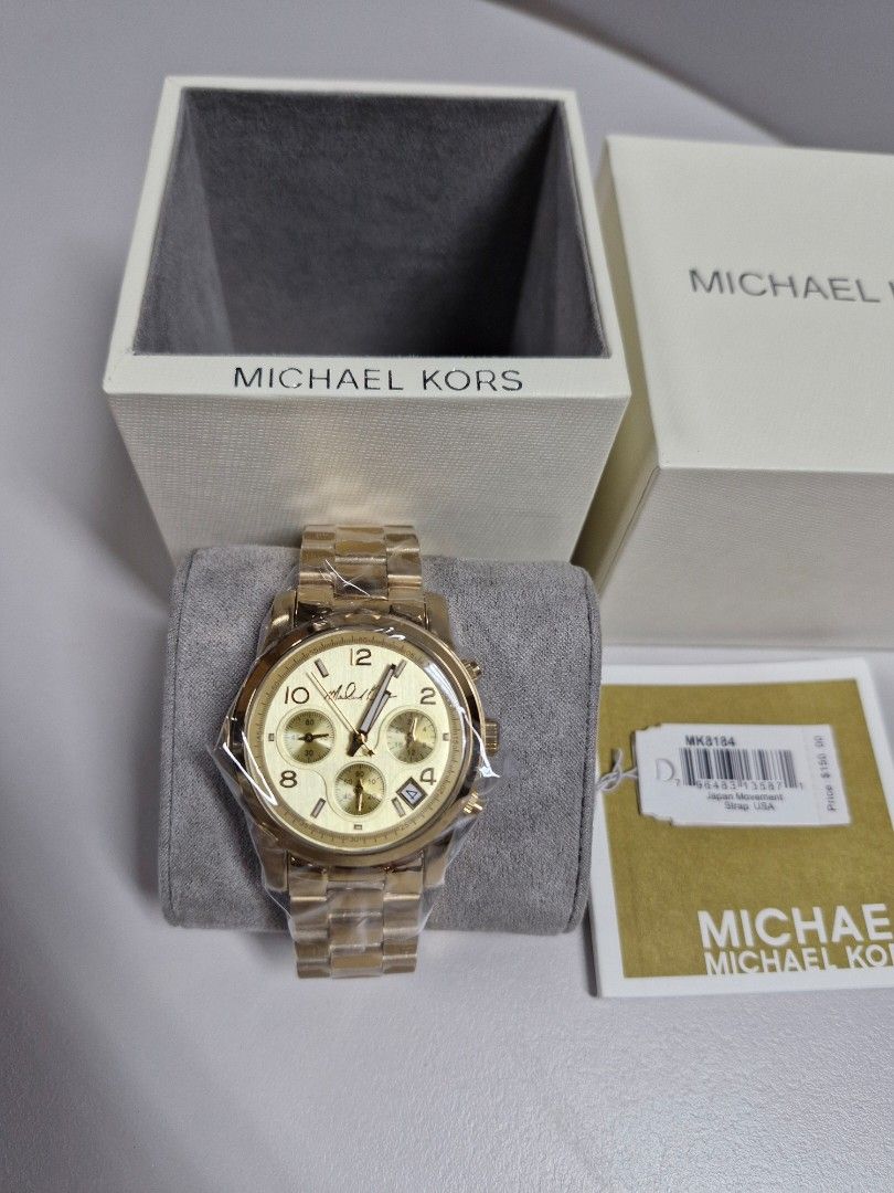 Michael Kors Gold Chronograph Watch MK194 (Category: Luxury Watches) located in Quezon City. Submitted by mysticriver.64959d (Listing ID 1462178207, Image 1). Description: - Authentic Michael Kors Gold Chronograph Watch - Brand New with Original Box and Tags - Features Date Display and Three Subdials - Reliable Japan Movement - Strap Made in USA - Original Price Tag: $150.00 - Protective plastic still attached.