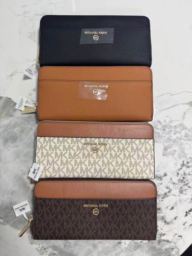 Michael Kors Wallet (Category: Wallets & Card holders) located in Manila. Submitted by bagsandmanymanymore1 (Listing ID 1462065230, Image 1). Description: MK Wallet Paperbag, dustbag and box Actual photos posted.