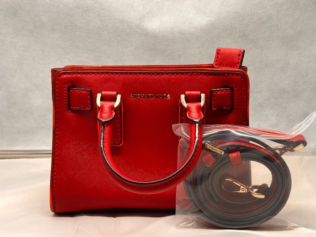Michael Kors XS Mercer Crossbody (Category: Shoulder Bags) located in Mandaluyong City. Submitted by fayeee_26 (Listing ID 1462092421, Image 1). Description: - Authentic Red Michael Kors Satchel Bag - Genuine Saffiano Leather - Detachable Crossbody Strap Included - Elegant Gold Hardware Details - Immaculate Interior Condition - Versatile: Ideal for Daily Errands or Evening Events - w/ dustbag - mint condition PRICE SLIGHTLY NEGOTIABLE .