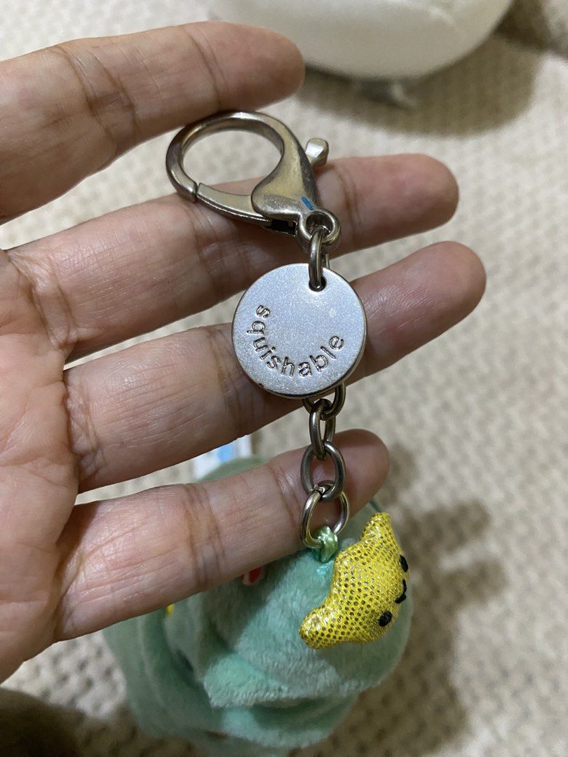 Micro Squishable Christmas Tree Keychain (Category: Plushies & Soft Toys) located in Cavite. Submitted by momrocks (Listing ID 1462055747, Image 3). Description: Micro Squishable Christmas Tree Keychain featuring a soft green plush body with embroidered holiday details and a cheerful yellow star on top.