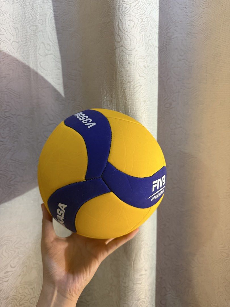Mikasa V200W Official Game Volleyball (Category: Racket and Ball Sports) located in Manila. Submitted by cesca28 (Listing ID 1462161571, Image 3). Description: - Mikasa V200W Official Game Volleyball - Eye-catching Yellow and Blue design - Official Size and Weight for authentic play - Versatile for both Indoor and Outdoor use - Ready to elevate your next game!.