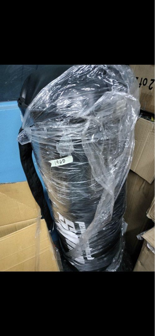 Mini Boxing Punching Bag (Category: Combat Sports) located in Quezon City. Submitted by myredbox (Listing ID 1462124887, Image 2). Description: - Black mini punching bag - Wrapped in plastic - Ready for a new home - Great for training.