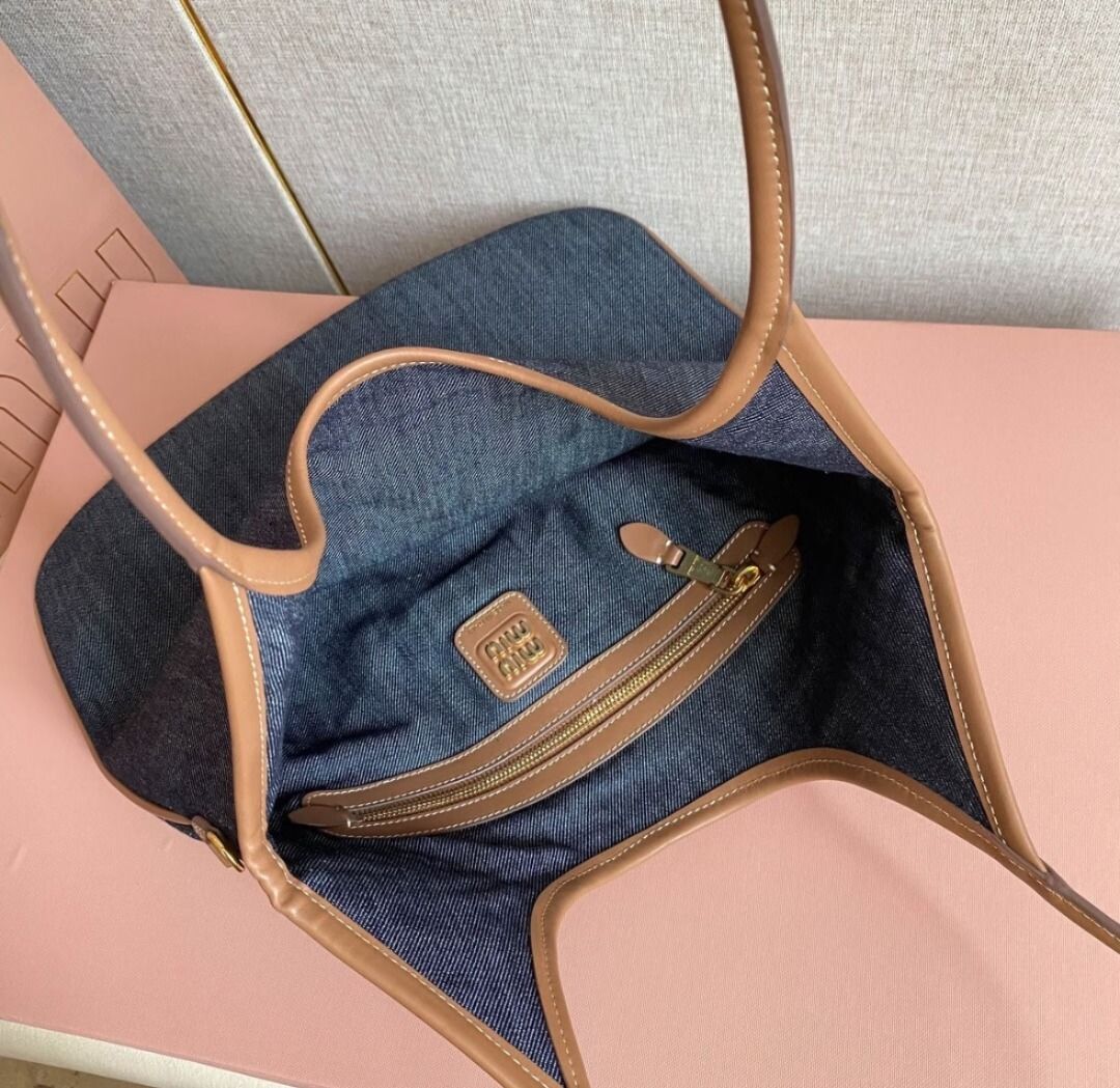 miu ivy tote bag (Category: Beach Bags) located in Quezon City. Submitted by japanandsingaporeluxepreloved (Listing ID 1462047102, Image 3). Description: .