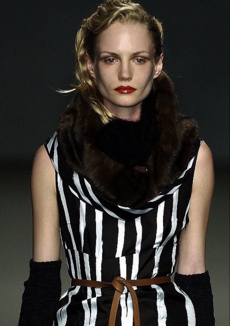 Miumiu Prada FW/03 Draped Neckline Top (Category: Luxury Apparel) located in Quezon City. Submitted by rebirthalley (Listing ID 1460855719, Image 1). Description: Width-16 Length-17 Hem-15.5 Excellent Condition No flaws.