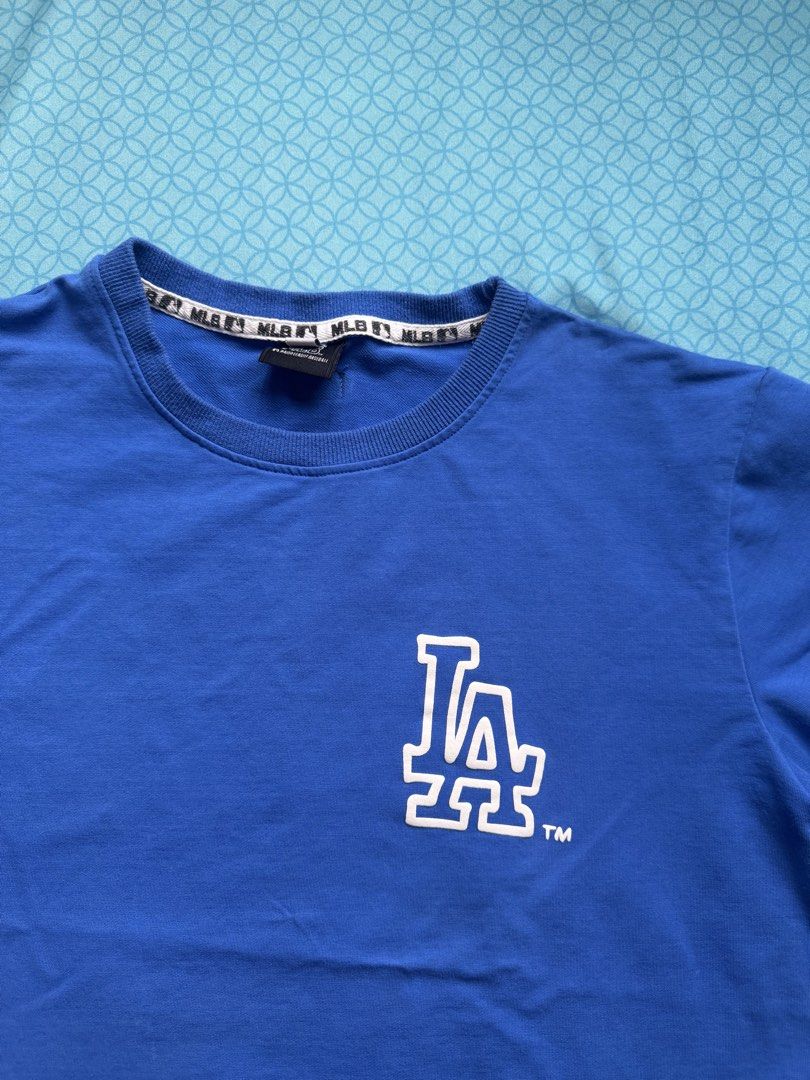 MLB Blue T-shirt (Category: Shirts) located in Quezon City. Submitted by rae.e13 (Listing ID 1462093966, Image 3). Description: Unisex Used once, not my style See last slides for dimensions .
