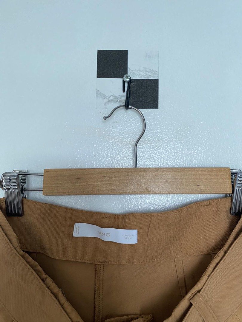 MNG Belted High-Waisted Shorts - Camel (Category: Shorts) located in Makati City. Submitted by tors.villa (Listing ID 1462042205, Image 3). Description: - Cute camel colored shorts from MNG - High-waisted style - Comes with a matching belt - Features pleated front detail - Functional side pockets - Perfect for casual or dressed-up looks - Easy to pair with any top.