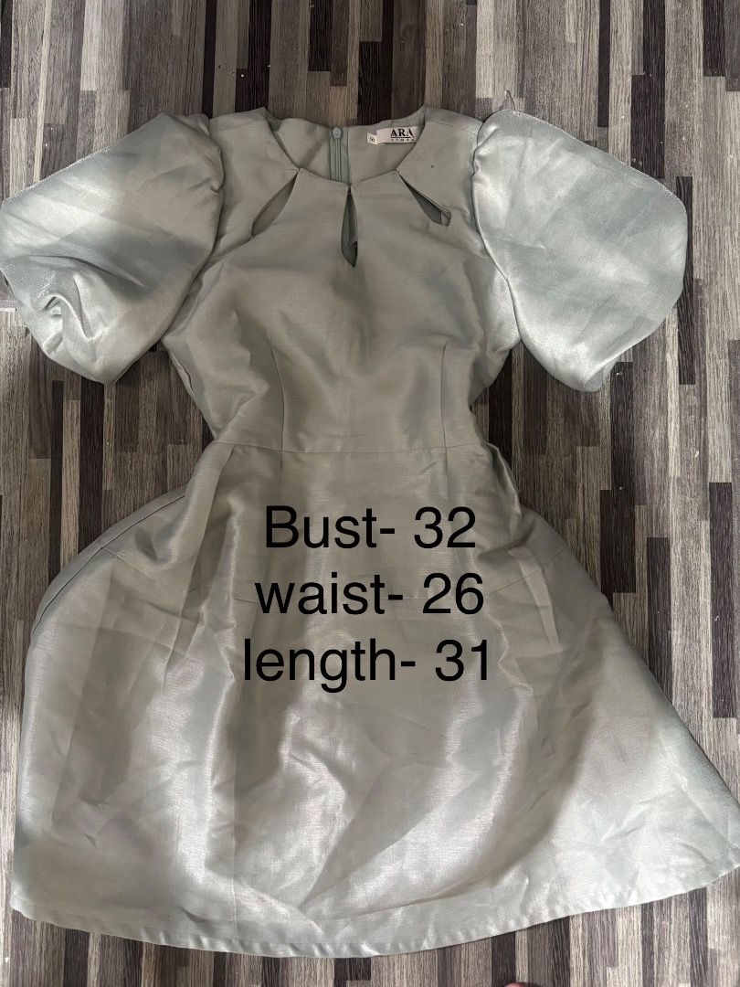 Modern Filipiniana (Category: Blouses) located in Caloocan City. Submitted by niki.niki. (Listing ID 1462154500, Image 1). Description: - Ara Storez top - Size: S - Color: Light sage green - Condition: Has a small mark on the front and a few small marks near the seam. Please check photos for details..