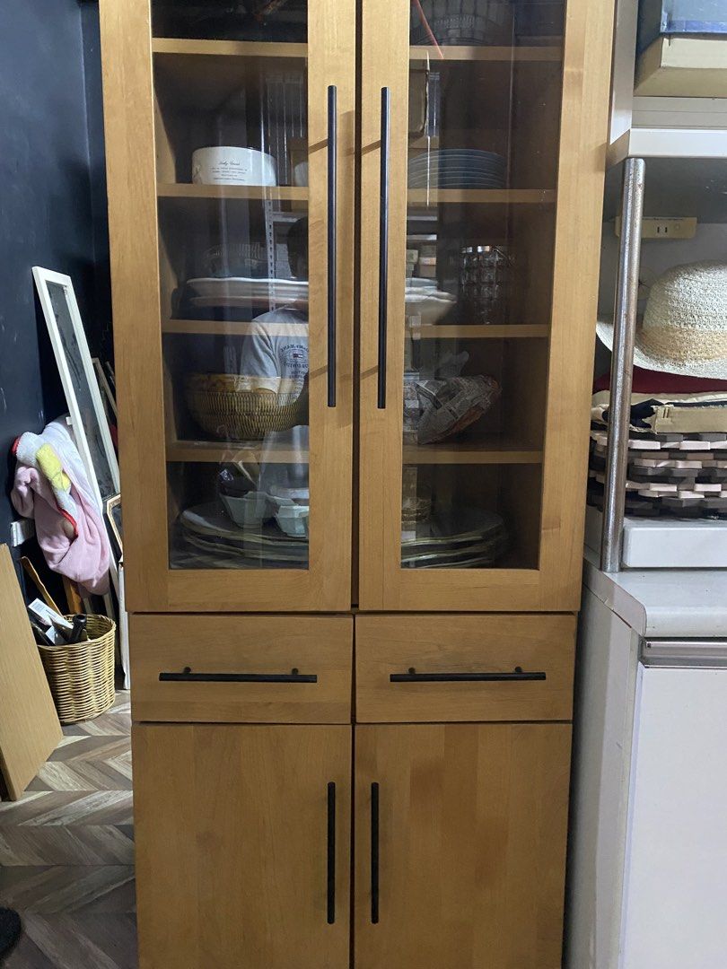 Modern Wooden Display Cabinet (Category: Shelves, Cabinets & Racks) located in Carmona. Submitted by myy_yy (Listing ID 1462145825, Image 1). Description: ✨ Features: Tall, spacious design Glass-front upper display doors Multiple interior shelves 2 large drawers Lower enclosed storage cabinet Elegant light wood finish Long black modern handles Plenty of storage space Clean, simple contemporary design 📏 Dimensions: 175cm × 60cm × 45cm 💰 Price: ₱