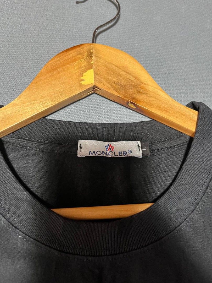 Moncler Black T-shirt with Logo (Category: Tshirts & Polo Shirts ) located in Surigao. Submitted by lyn.thrift_shop (Listing ID 1462078490, Image 3). Description: - Brand: Moncler off - Size: Medium width 19 length 24.5 - As new - Color rate 9.5/10 - No issue, no pinhole, no stain, not faded .