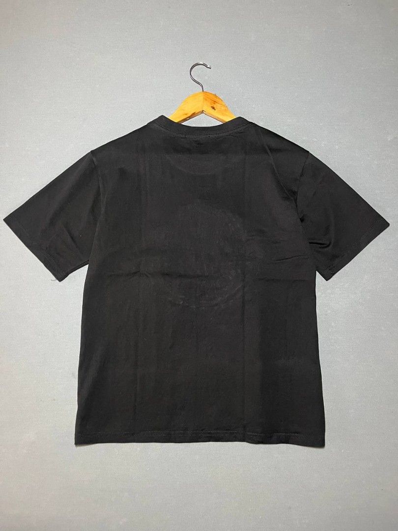 Moncler Black T-shirt with Logo (Category: Tshirts & Polo Shirts ) located in Surigao. Submitted by lyn.thrift_shop (Listing ID 1462078490, Image 2). Description: - Brand: Moncler off - Size: Medium width 19 length 24.5 - As new - Color rate 9.5/10 - No issue, no pinhole, no stain, not faded .