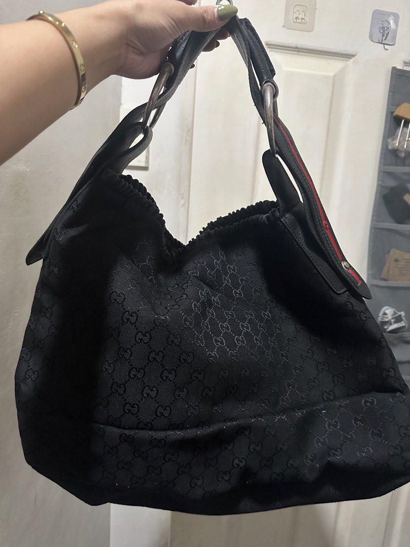 Monogram Large Horsebit Chain Hobo Bag (Category: Shoulder Bags) located in Quezon City. Submitted by cnccollections (Listing ID 1462112421, Image 2). Description: With lost button, see 4th slide. Needs cleaning. Slightly negotiable..