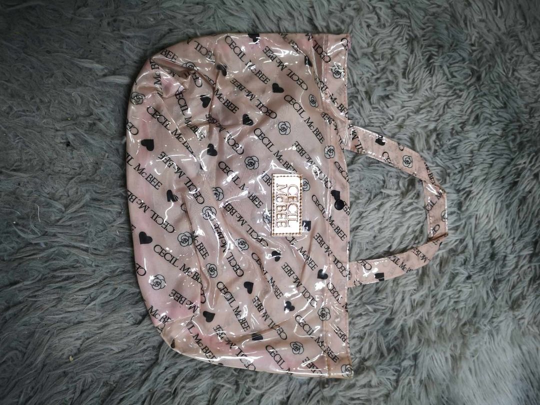 Monogram Print PVC Snap Closure Tote Bag (Category: Tote Bags) located in Santa Cruz. Submitted by jmy_surplus.2 (Listing ID 1462100114, Image 2). Description: Size ; L - 8.6 W - 13 Color ; Peach Type ; Tote Bag Brand ; No brand Material ; PVC Style ; PVC Snap Closure peach Tote bag LR 129 JMY 1 Batch #221.