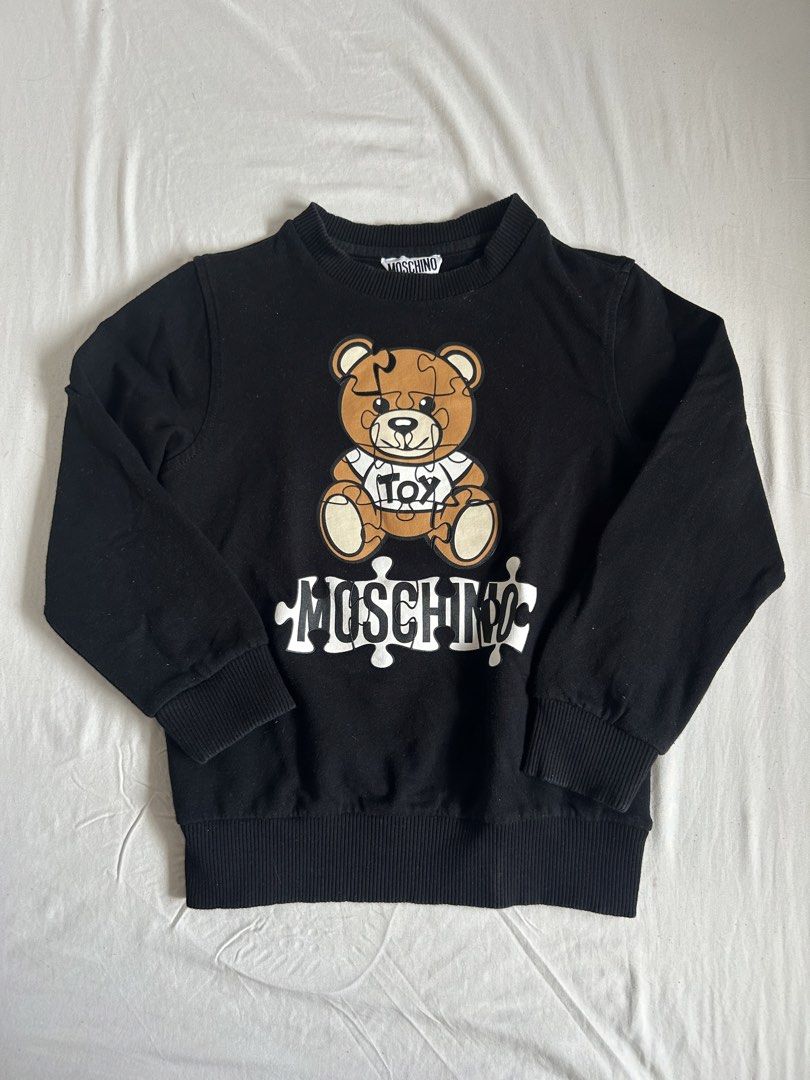 Moschino sweater (Category: Babies & Kids Fashion) located in Tacloban City. Submitted by homeresmik34297 (Listing ID 1462072564, Image 1). Description: 6T.