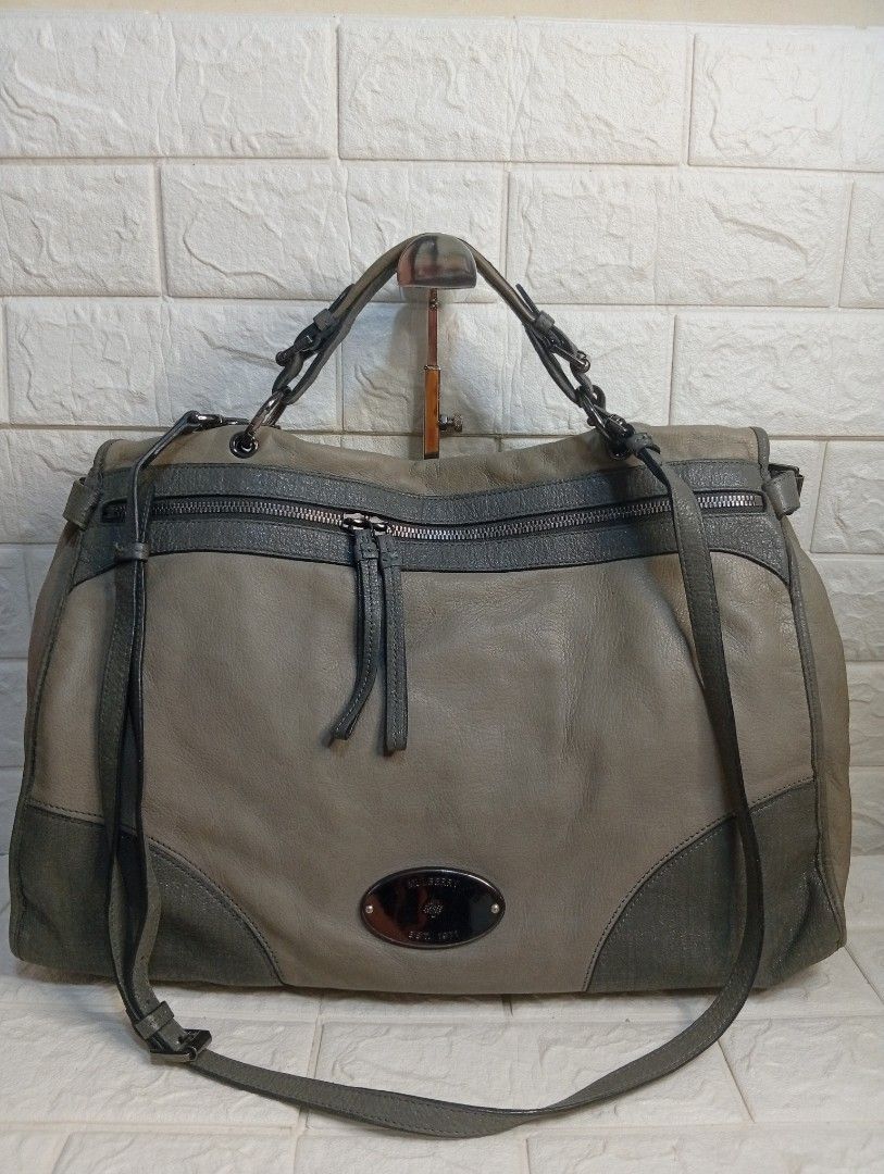 Mulberry Oversized Taylor 2-way Satchel Bag (Category: Tote Bags) located in Las Pinas. Submitted by etoksi1234 (Listing ID 1462200957, Image 1). Description: Pre-loved Mulberry Oversized Taylor Satchel featuring a two-tone grey leather design and gunmetal hardware..
