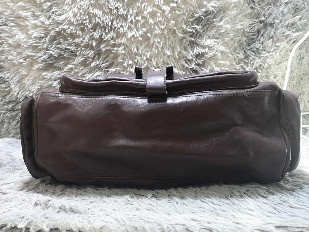 Multiple Front Zippered Pockets Leather Shoulder Bag (Category: Shoulder Bags) located in Santa Cruz. Submitted by jmy_surplus.2 (Listing ID 1462080692, Image 3). Description: Size ; L - 15 W - 17 Color ; Dark brown Type ; Shoulder bag Brand ; No brand Material ; Leather Style ; Dark brown Leather Shoulder bag LR 164 JMY 4 Batch #220.