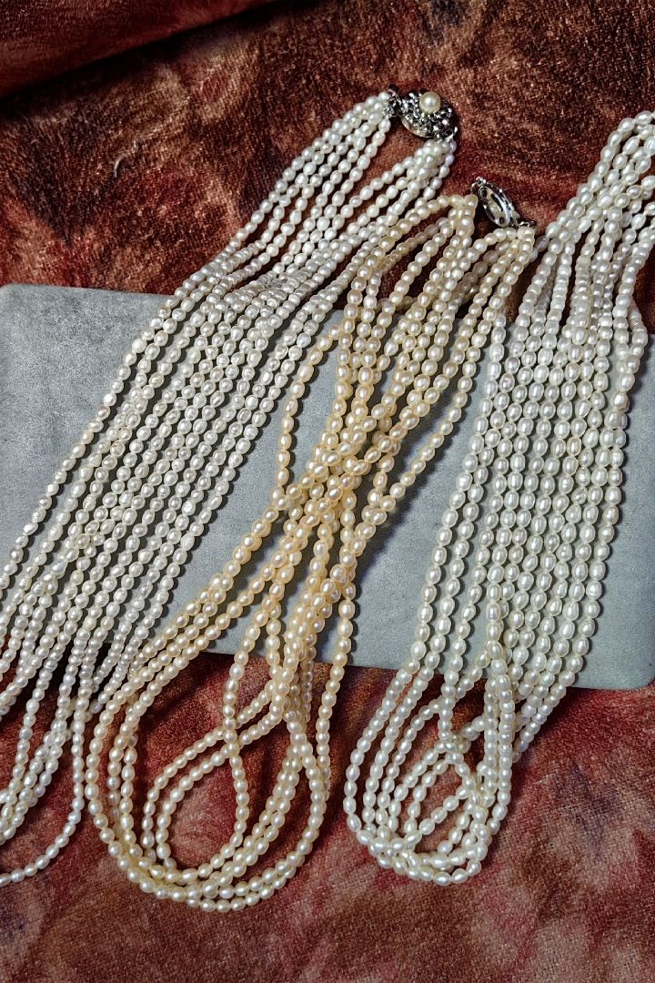 Multi-strand Seed Pearl Necklaces with Clasp (Category: Necklaces) located in Caloocan City. Submitted by jeremiah.curator.2026 (Listing ID 1462258498, Image 1). Description: - Multi-strand necklace - Features small, oval-shaped seed pearls - Each necklace has a silver-tone clasp - Ideal for layering or wearing individually - Adds a classic touch to any outfit.