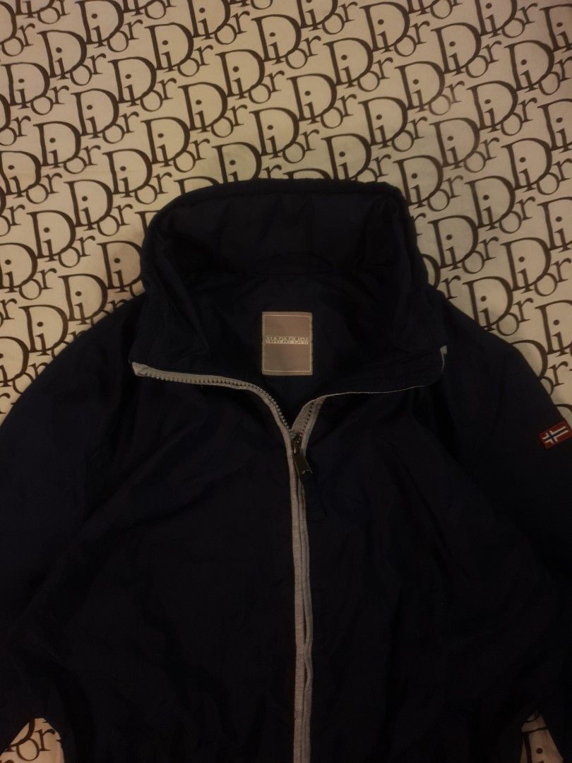 Napapijri Windbreaker with Hood (Category: Coats, Jackets and Outerwear) located in San Fernando. Submitted by retro.district. (Listing ID 1462250939, Image 2). Description: - Napapijri Windbreaker with hood - Size: Medium (M) - Large (W) - Condition: Excellent - no issue - Color Rate: 9.5/10.