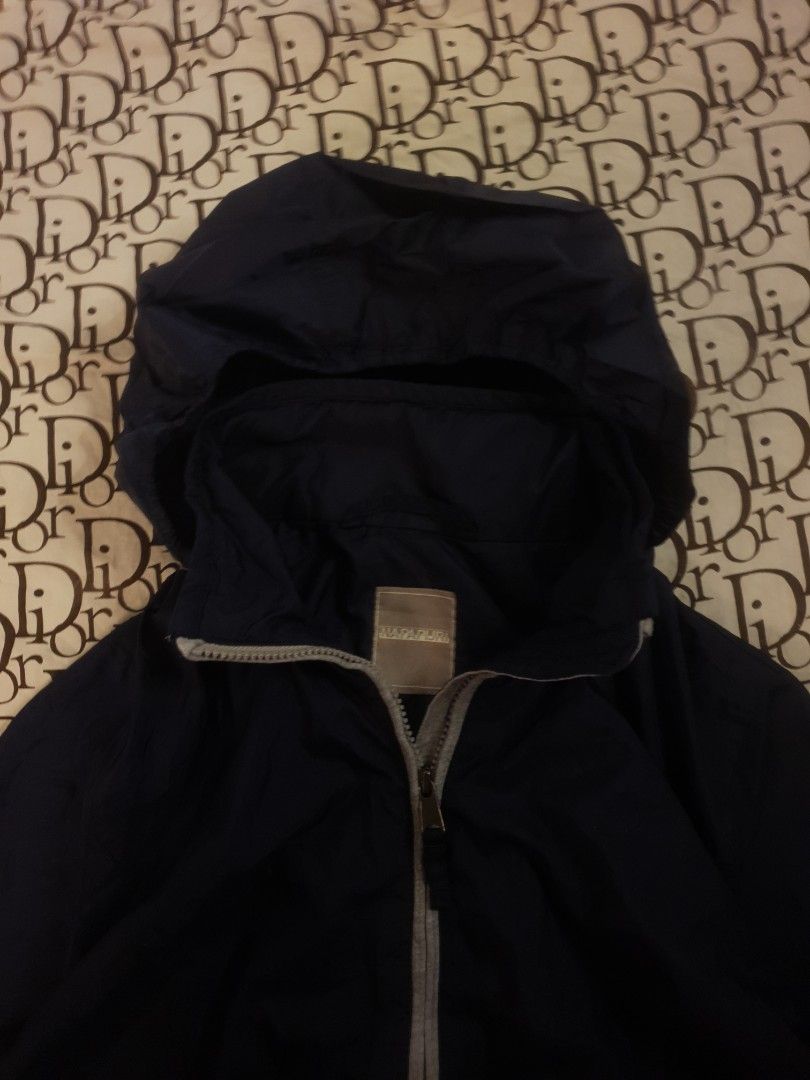 Napapijri Windbreaker with Hood (Category: Coats, Jackets and Outerwear) located in San Fernando. Submitted by retro.district. (Listing ID 1462250939, Image 3). Description: - Napapijri Windbreaker with hood - Size: Medium (M) - Large (W) - Condition: Excellent - no issue - Color Rate: 9.5/10.