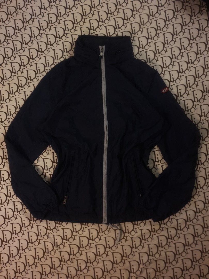 Napapijri Windbreaker with Hood (Category: Coats, Jackets and Outerwear) located in San Fernando. Submitted by retro.district. (Listing ID 1462250939, Image 1). Description: - Napapijri Windbreaker with hood - Size: Medium (M) - Large (W) - Condition: Excellent - no issue - Color Rate: 9.5/10.