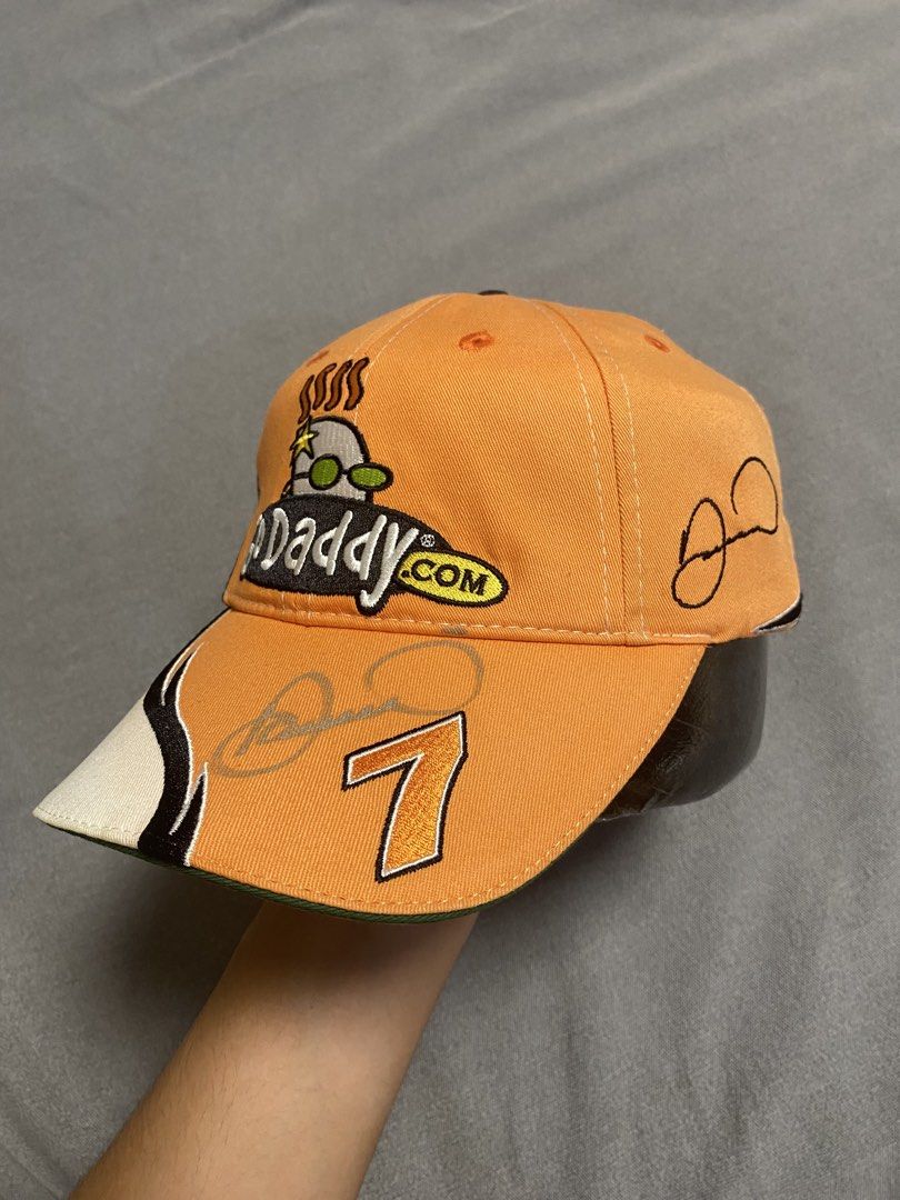 Nascar Go daddy.com Cap (Category: Caps & Hats) located in Cabuyao City. Submitted by ukaythriftshirt (Listing ID 1462250517, Image 2). Description: Nascar Go Daddy.Com Cap (With Signature) Excellent Condition Adjustable Size No hard issue sign of usage only - 450.