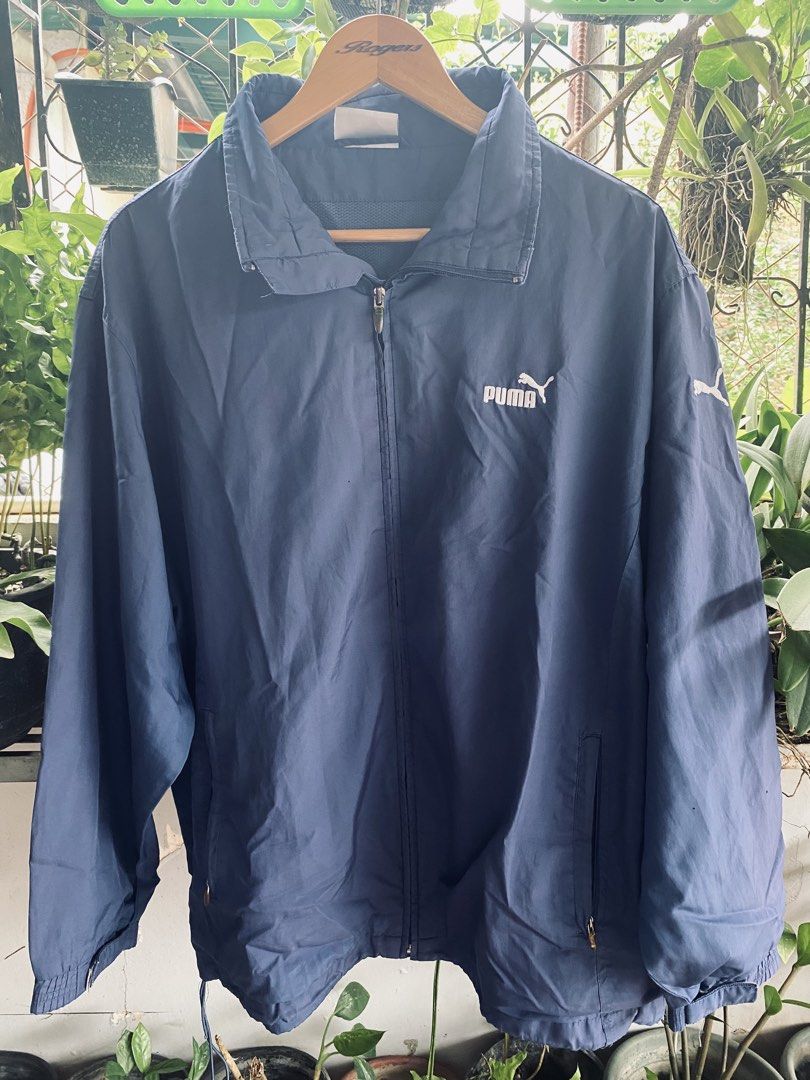 Navy Blue Puma Track Jacket (Category: Coats, Jackets and Outerwear) located in Davao. Submitted by ippotech (Listing ID 1462105099, Image 1). Description: - L 29x25 - Full zip closure - Convenient front pockets - Puma logo on chest - Smaller Puma logo on back - Ideal for casual wear or sports - Easy to layer for versatile styling.