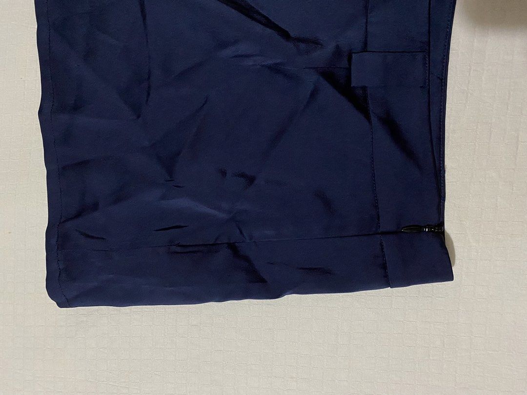 Navy Blue Satin Mini Skirt (Category: Skirts) located in Quezon City. Submitted by getitrightaway.ph (Listing ID 1462173917, Image 3). Description: - Navy blue satin mini skirt -With inner shorts - Features belt loops - Convenient side zip closure - Beautiful fabric sheen - Estimated size: Small to Medium - Perfect for dressing up or down.