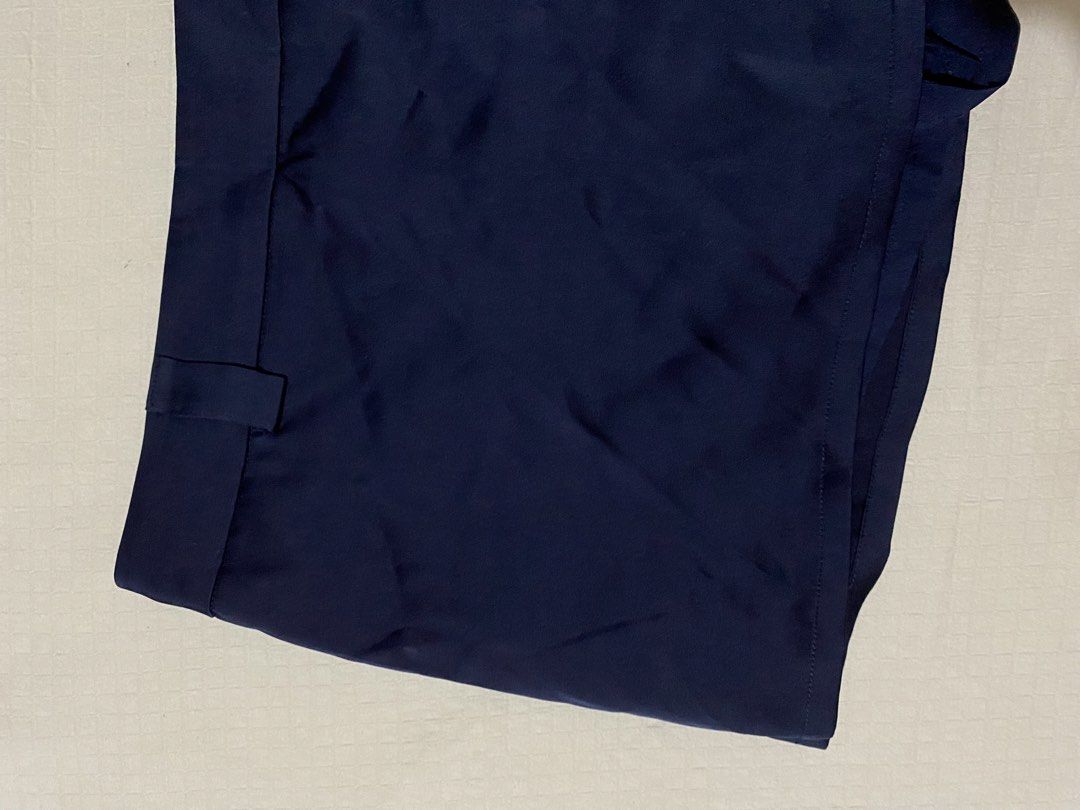 Navy Blue Satin Mini Skirt (Category: Skirts) located in Quezon City. Submitted by getitrightaway.ph (Listing ID 1462173917, Image 2). Description: - Navy blue satin mini skirt -With inner shorts - Features belt loops - Convenient side zip closure - Beautiful fabric sheen - Estimated size: Small to Medium - Perfect for dressing up or down.
