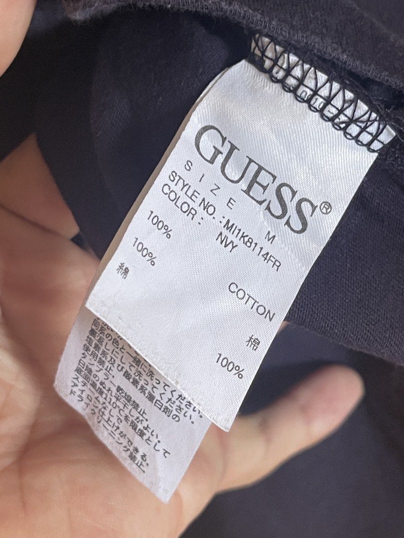 Navy GUESS Long Sleeve Shirt Size M (Category: Tshirts & Polo Shirts ) located in Cabanatuan. Submitted by jrawrrr (Listing ID 1462089541, Image 3). Description: - GUESS Navy Blue Long-Sleeved Shirt - Iconic white and red GUESS logo printed across the back - Made of 100% comfortable cotton - Perfect for casual, everyday wear -W22 L29.