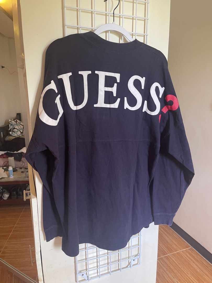 Navy GUESS Long Sleeve Shirt Size M (Category: Tshirts & Polo Shirts ) located in Cabanatuan. Submitted by jrawrrr (Listing ID 1462089541, Image 1). Description: - GUESS Navy Blue Long-Sleeved Shirt - Iconic white and red GUESS logo printed across the back - Made of 100% comfortable cotton - Perfect for casual, everyday wear -W22 L29.