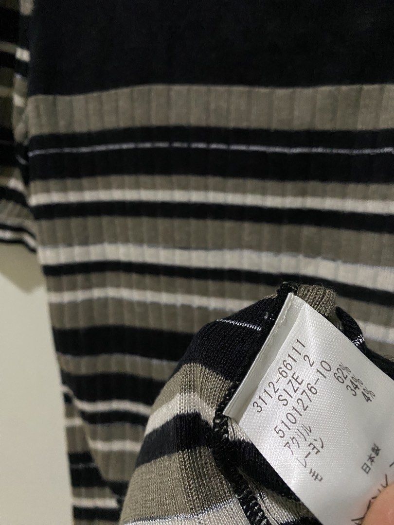 Navy striped knit top (Category: Shirts) located in Makati City. Submitted by indaysukaycloset (Listing ID 1462083458, Image 3). Description: NAVY STRIPED KNIT TOP! 💙 Mine: stripes ₱120 Brand: LAUTREAMONT Japan | Size 2 Waist / Width: 16" flat (32" - stretchy up to 36") Length: 21" - Color: Navy / Khaki / White stripes - Ribbed knit, soft & stretchy - comfy! - Sheer upper part, puff sleeves design - Pang-office / pang-casual / old money look - 1