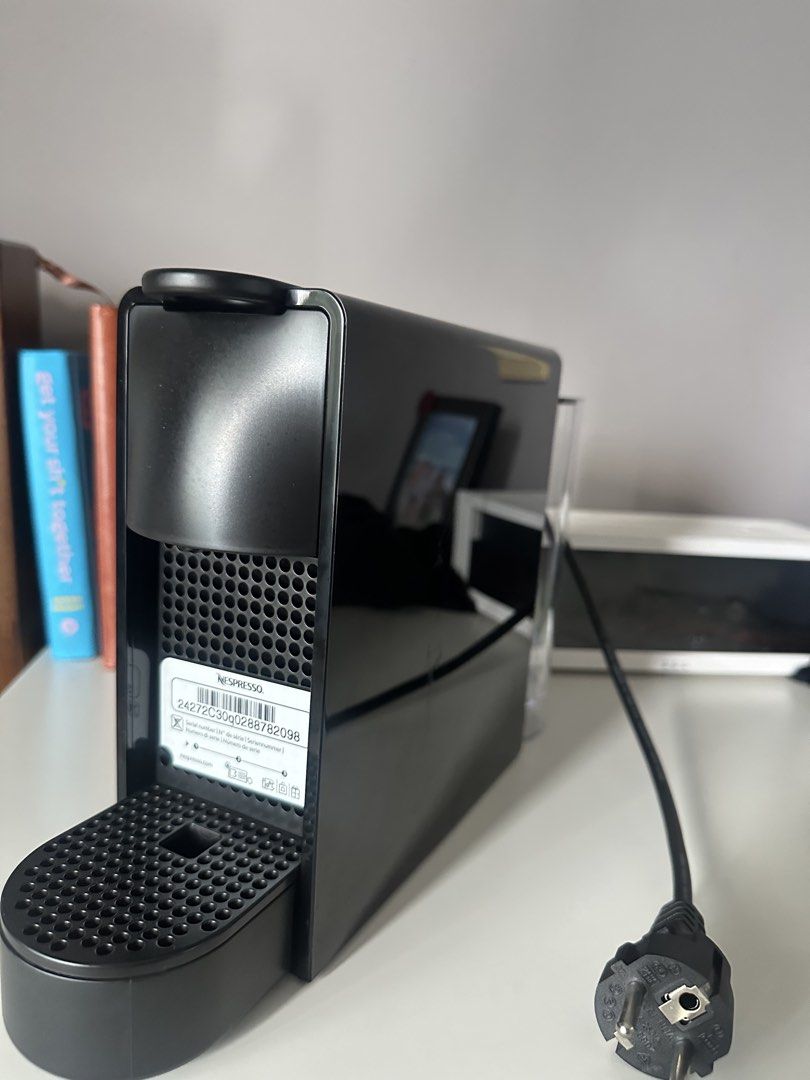 Nespresso Essenza Mini Coffee Machine Black (Category: Coffee Machines & Makers) located in Manila. Submitted by happywolf.4fcf2f (Listing ID 1462094678, Image 2). Description: - Nespresso Essenza Mini Coffee Machine - Color: Black - Compact and space-saving design - Includes water tank and drip tray - Comes with original manuals - Perfect for your daily coffee needs.