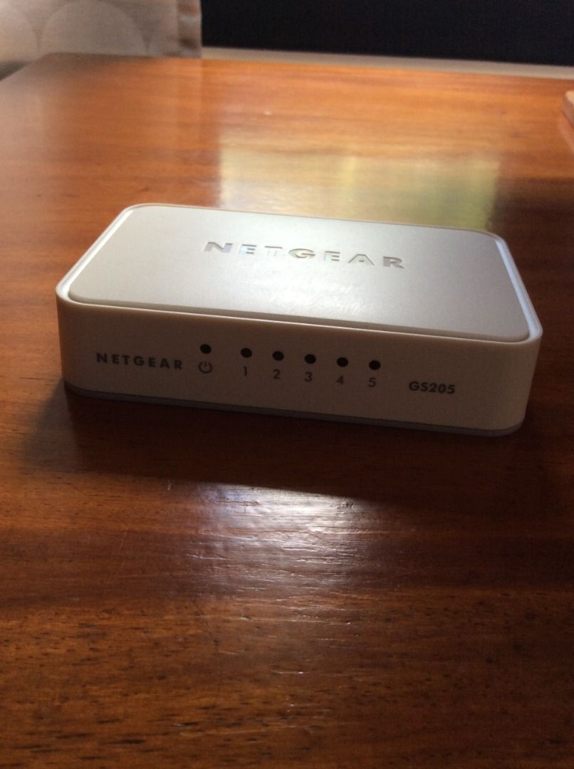 NETGEAR GS205 5-Port Gigabit Ethernet Switch (Category: Networking) located in Silang. Submitted by lorenzo0000 (Listing ID 1462082804, Image 2). Description: - Netgear GS205 5-port Gigabit Ethernet Switch - Expand your wired network with 5 ports - Simple plug-and-play setup - Includes original power adapter - Tested and confirmed working - Includes power supply.