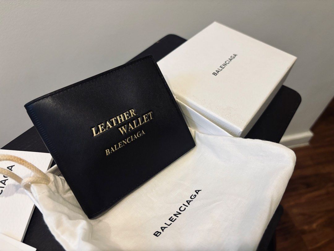 NEW Authentic BALENCIAGA Bifold Wallet for Men (Category: Wallets & Card Holders) located in Paranaque City. Submitted by mysinfulindulgence (Listing ID 1462199585, Image 2). Description: New with tag, cards, dustbag and box Guaranteed authentic Balenciaga wallet bought from Mr Porter in the UK Your purchase will help feed and care for the Cats of NSHA😻🙏 Pick up loc: bf homes paranaque Mop: bdo / gcash Mod: lbc, grab or lalamove .