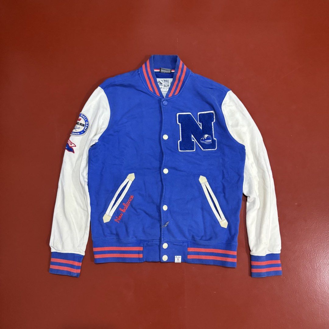 NEW BALANCE BASEBALL VARSITY JACKET (Category: Coats, Jackets and Outerwear) located in Pasig City. Submitted by buzzthrifty (Listing ID 1462204080, Image 1). Description: SIZE M-L 22x26 EXCELLENT CONDITION NEEDS WASH ONLY .