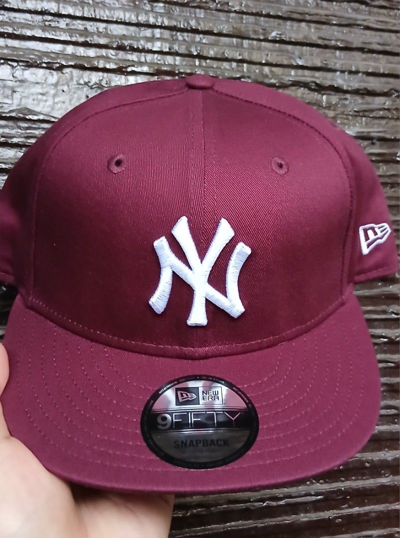 New Era 9FIFTY Snapback Cap - Burgundy (Category: Caps & Hats) located in San Mateo. Submitted by edayz709 (Listing ID 1462043765, Image 3). Description: - Brand: New Era - Style: 9FIFTY Snapback - Color: Burgundy - Team Logo: New York Yankees (embroidered in white) - Fit: Adjustable snapback closure - Ideal for: Yankees fans, streetwear enthusiasts - Condition: Brand new - Shipping: Ready to ship.