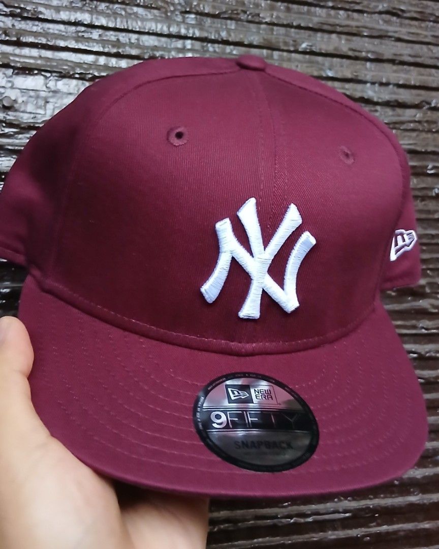 New Era 9FIFTY Snapback Cap - Burgundy (Category: Caps & Hats) located in San Mateo. Submitted by edayz709 (Listing ID 1462043765, Image 2). Description: - Brand: New Era - Style: 9FIFTY Snapback - Color: Burgundy - Team Logo: New York Yankees (embroidered in white) - Fit: Adjustable snapback closure - Ideal for: Yankees fans, streetwear enthusiasts - Condition: Brand new - Shipping: Ready to ship.