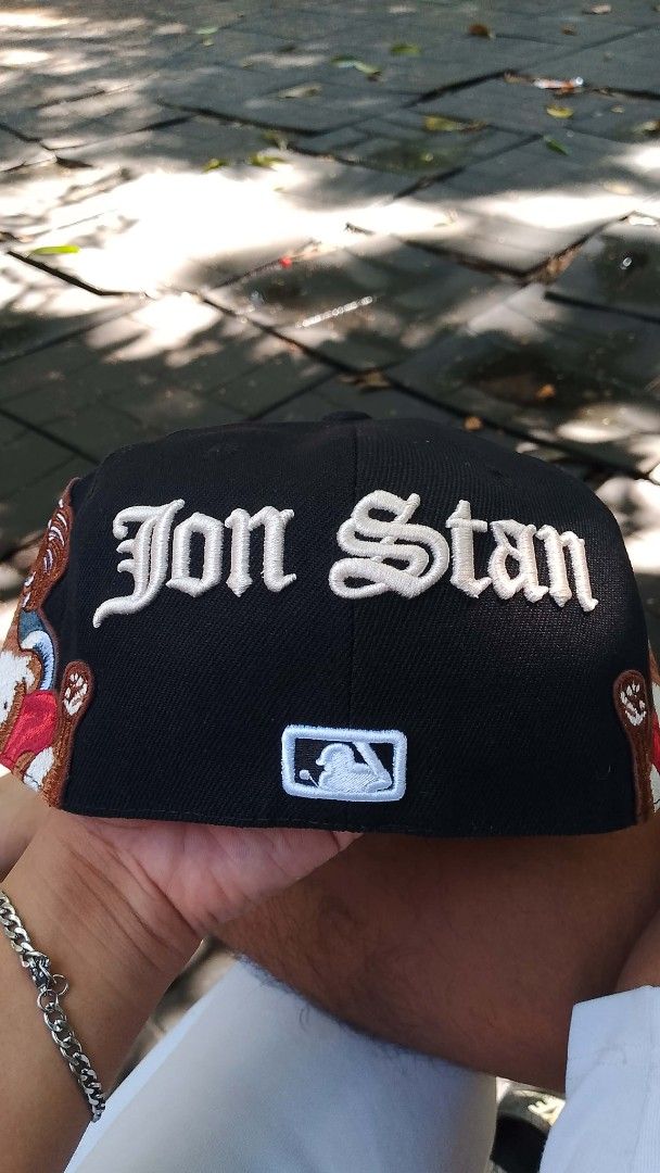 New Era LA Dodgers "Jon Stan" Fitted Cap (Category: Caps & Hats) located in Caloocan City. Submitted by jackal06 (Listing ID 1462097824, Image 2). Description: - Black fitted cap with LA Dodgers logo. - 'Jon Stan' embroidery on the back. - Unique cherub patches on the sides. - Perfect for Dodgers fans and collectors. - SIZES (7⅛) .