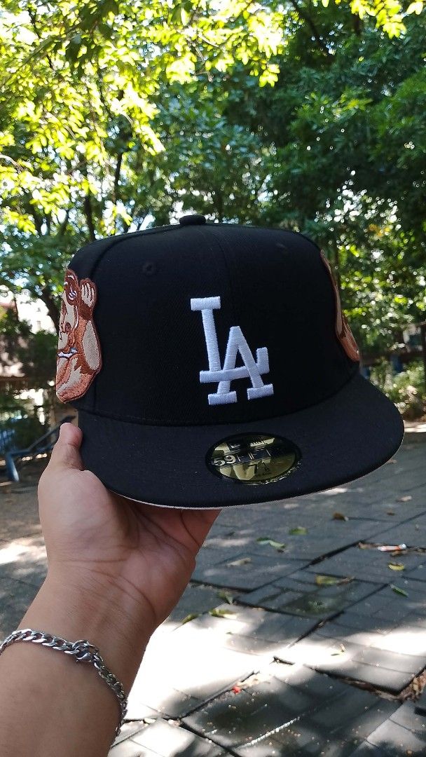 New Era LA Dodgers "Jon Stan" Fitted Cap (Category: Caps & Hats) located in Caloocan City. Submitted by jackal06 (Listing ID 1462097824, Image 1). Description: - Black fitted cap with LA Dodgers logo. - 'Jon Stan' embroidery on the back. - Unique cherub patches on the sides. - Perfect for Dodgers fans and collectors. - SIZES (7⅛) .