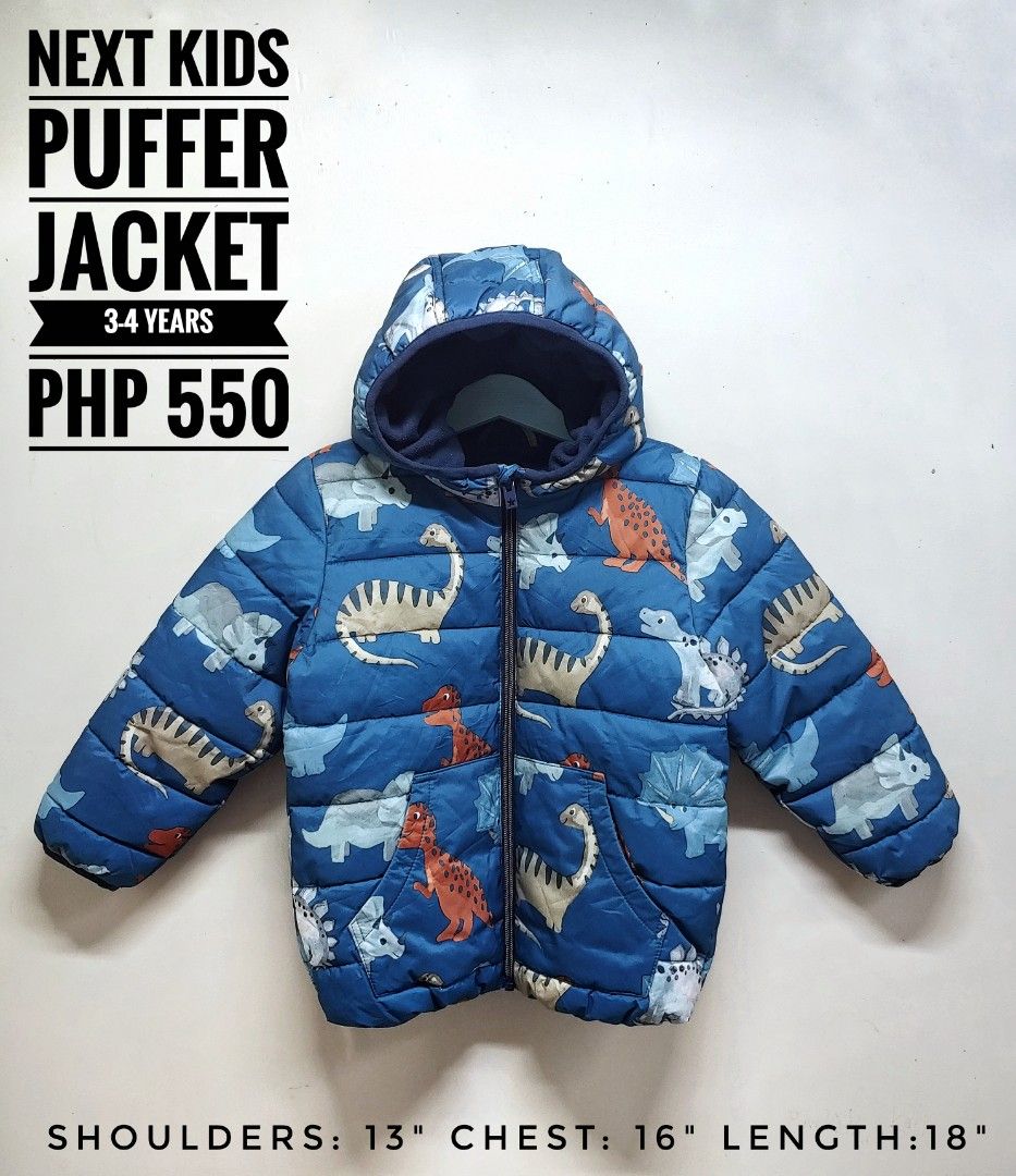 Next Kids Dinosaur Puffer Jacket 3-4 Years (Category: Babies & Kids Fashion) located in Dagupan City. Submitted by upforgrabs2400 (Listing ID 1462088329, Image 1). Description: Next Kids Dinosaur Puffer Jacket - Fits 3-4 years - Measurements: Shoulders 13", Chest 16", Length 18" - Features a fun all-over dinosaur print - Includes a hood and convenient pockets.