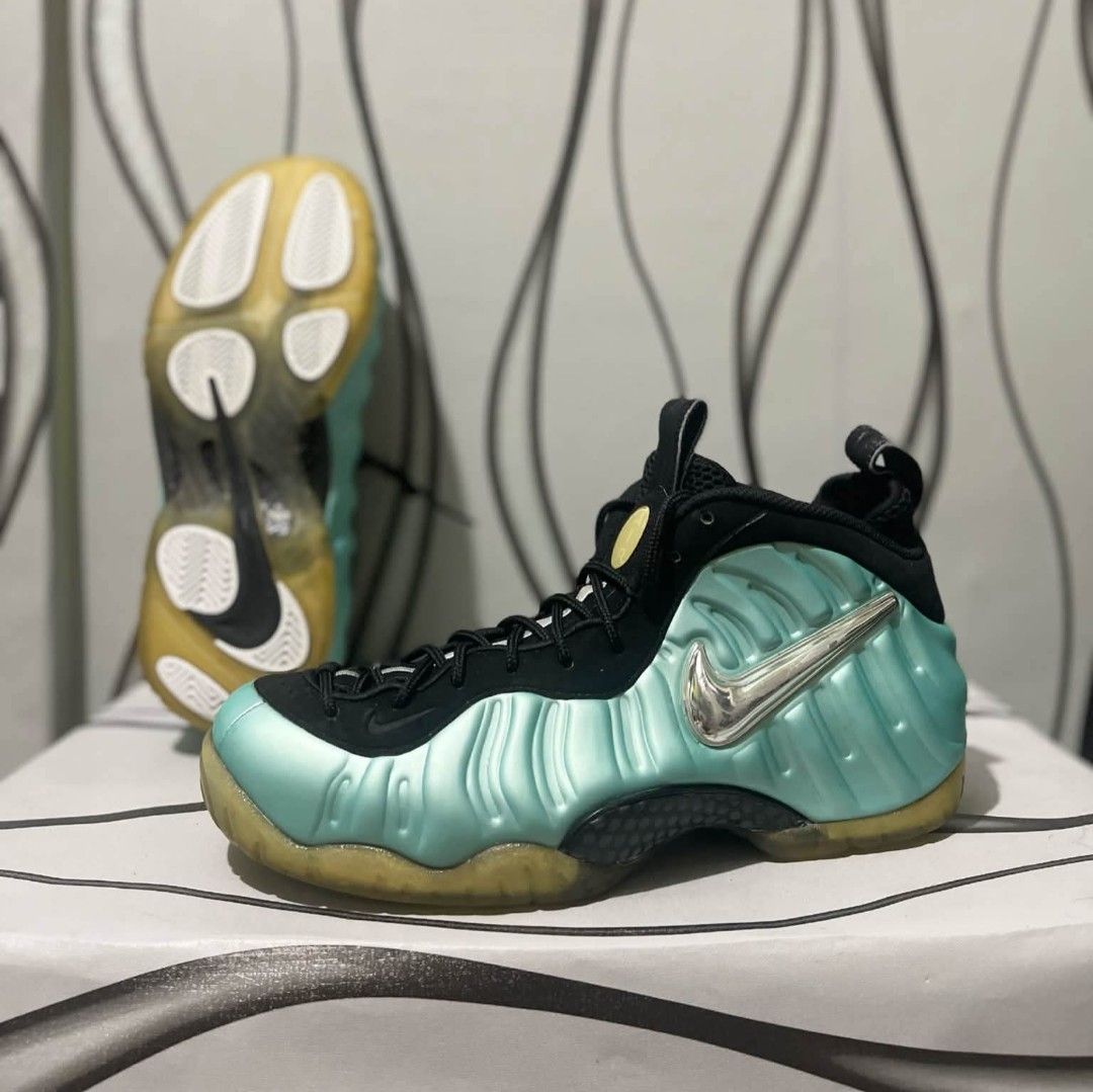 Nike Air Foamposite One "Mint" Sneakers (Category: Sneakers) located in Lapu-Lapu City. Submitted by shoeper_kai02 (Listing ID 1462104979, Image 1). Description: Selling a pair of Nike Air Foamposite One sneakers in a mint green colorway. These have a unique molded foam upper and a chrome swoosh. The soles show some yellowing and wear. Laces are black. Great for collectors or anyone looking for a statement pair..